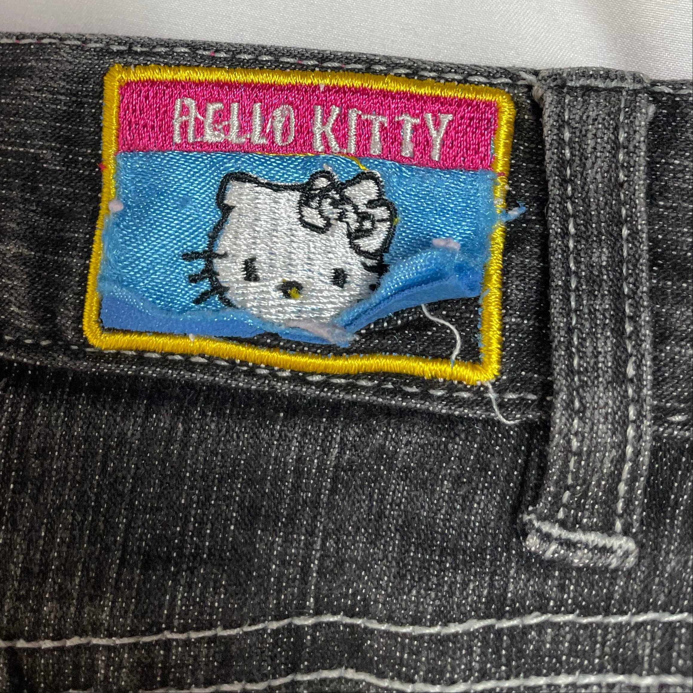 2000s Sanrio Hello Kitty Racing Jeans – Best Fit UK 4-6